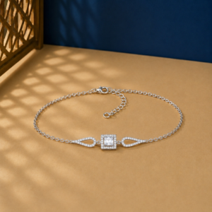 Princess cut lab diamond bracelet with square halo and pavé teardrop accents.