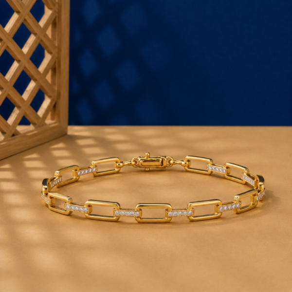 Paperclip lab diamond link bracelet in yellow gold with pavé diamond accents.