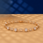 Round lab diamond halo bracelet in rose gold with alternating marquise links.