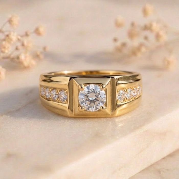 The Square Throne Signet Ring The Square Throne Signet Ring featuring a bold square-shaped signet design with sleek polished detailing and luxurious craftsmanship.