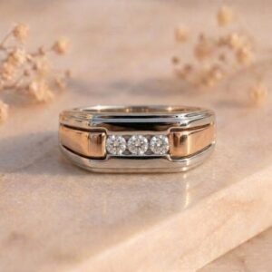 Three Stone Channel Set Two-Tone Signet Ring featuring a bold two-tone signet design with three channel-set sparkling lab-grown diamonds.