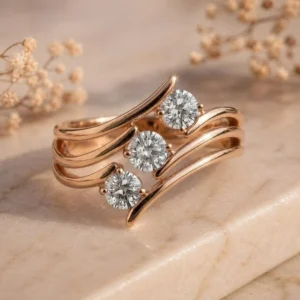 Triple Wave Bypass Three Stone Rose Gold Ring featuring flowing triple-wave bypass detailing with three sparkling lab-grown diamonds in a luxurious rose gold finish.