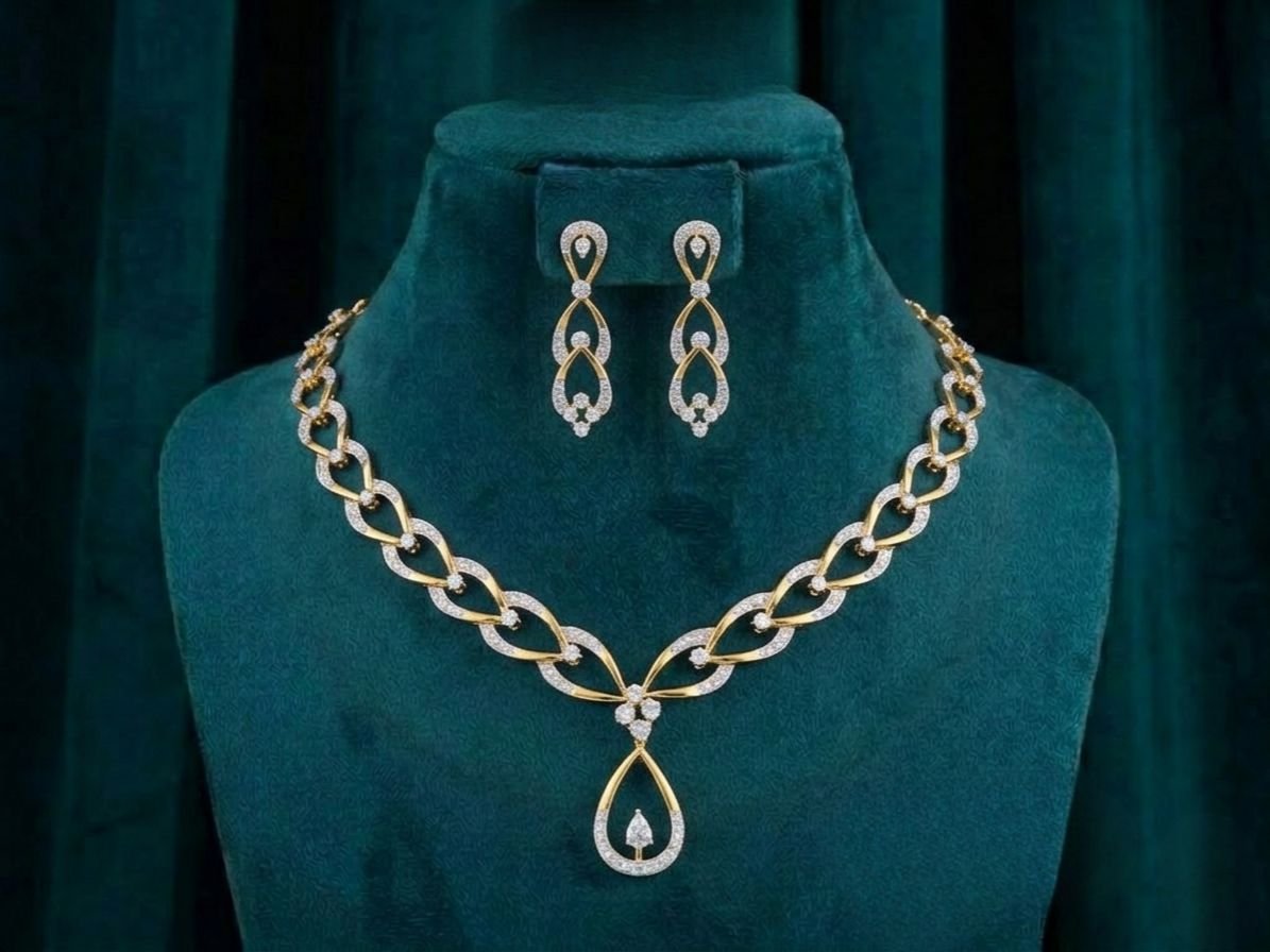 Twisted Oval Drop Diamond Set Twisted Oval Drop Diamond Set featuring elegant twisted oval motifs with graceful drop detailing adorned with sparkling lab-grown diamonds and matching earrings.