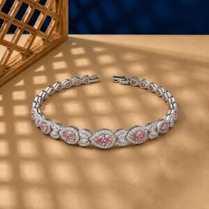 Pink pear-cut lab diamond bracelet with white diamond halos and marquise clusters.