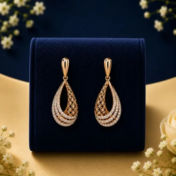 Elegant teardrop lab diamond gold earrings with intricate filigree design
