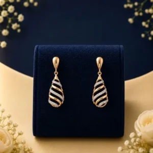 Twisted wave lab diamond drop earrings in yellow gold with sparkling diamond detailing