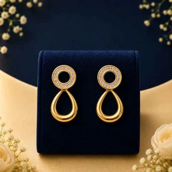 Modern halo teardrop lab diamond earrings in yellow gold with sparkling round diamonds