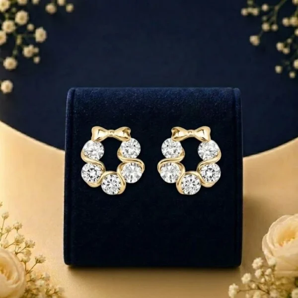 Bow circle lab diamond stud earrings in yellow gold with sparkling round diamonds