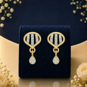 Elegant teardrop lab diamond dangle earrings in yellow gold with sparkling diamond accents
