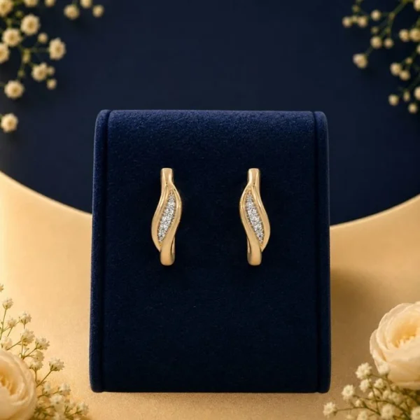 Elegant lab diamond earrings with twisted gold wave design for women