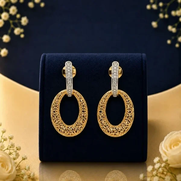 Designer oval gold drop earrings with intricate filigree design and lab grown diamond accents
