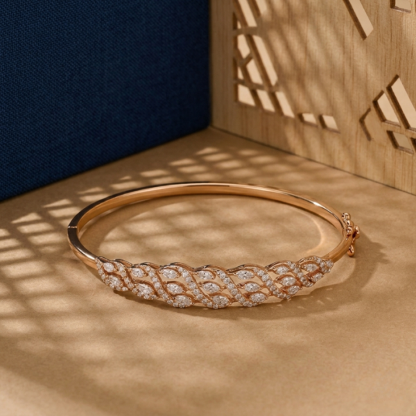 Woven vine-style bracelet with marquise lab-grown diamonds in a rose gold setting.