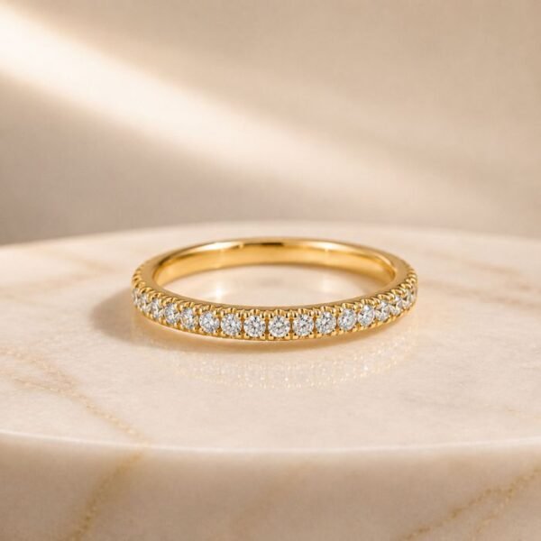 Half eternity lab diamond band ring in yellow gold featuring round brilliant diamonds