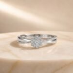 Floral cluster lab diamond twist ring in white gold featuring a sparkling flower-shaped diamond center