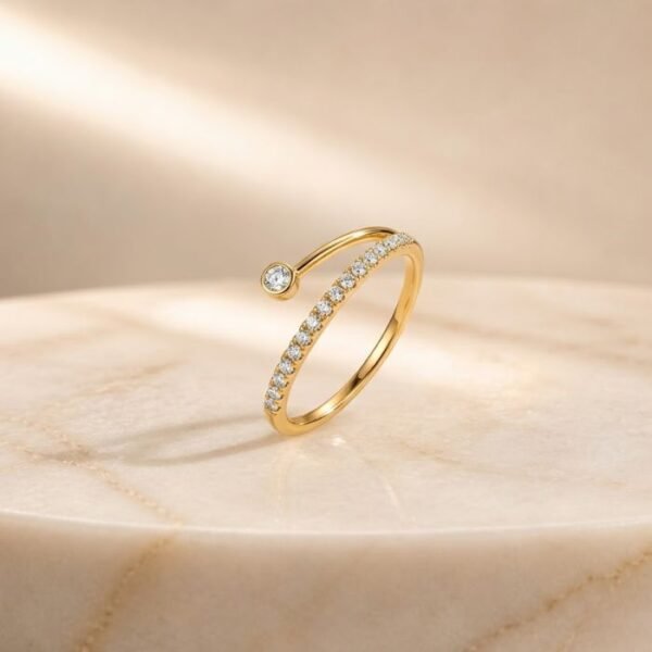 Open wrap lab diamond pavé ring in yellow gold with bezel-set round diamond accent