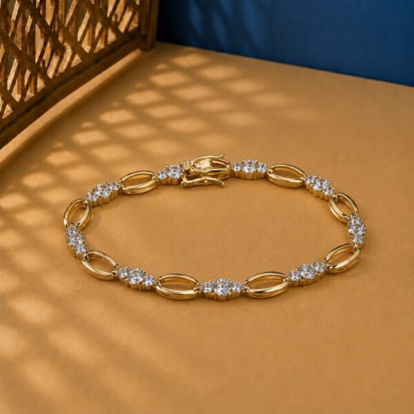 Oval Link Lab Diamond Bracelet featuring alternating polished gold ovals and diamond clusters on a tan background.