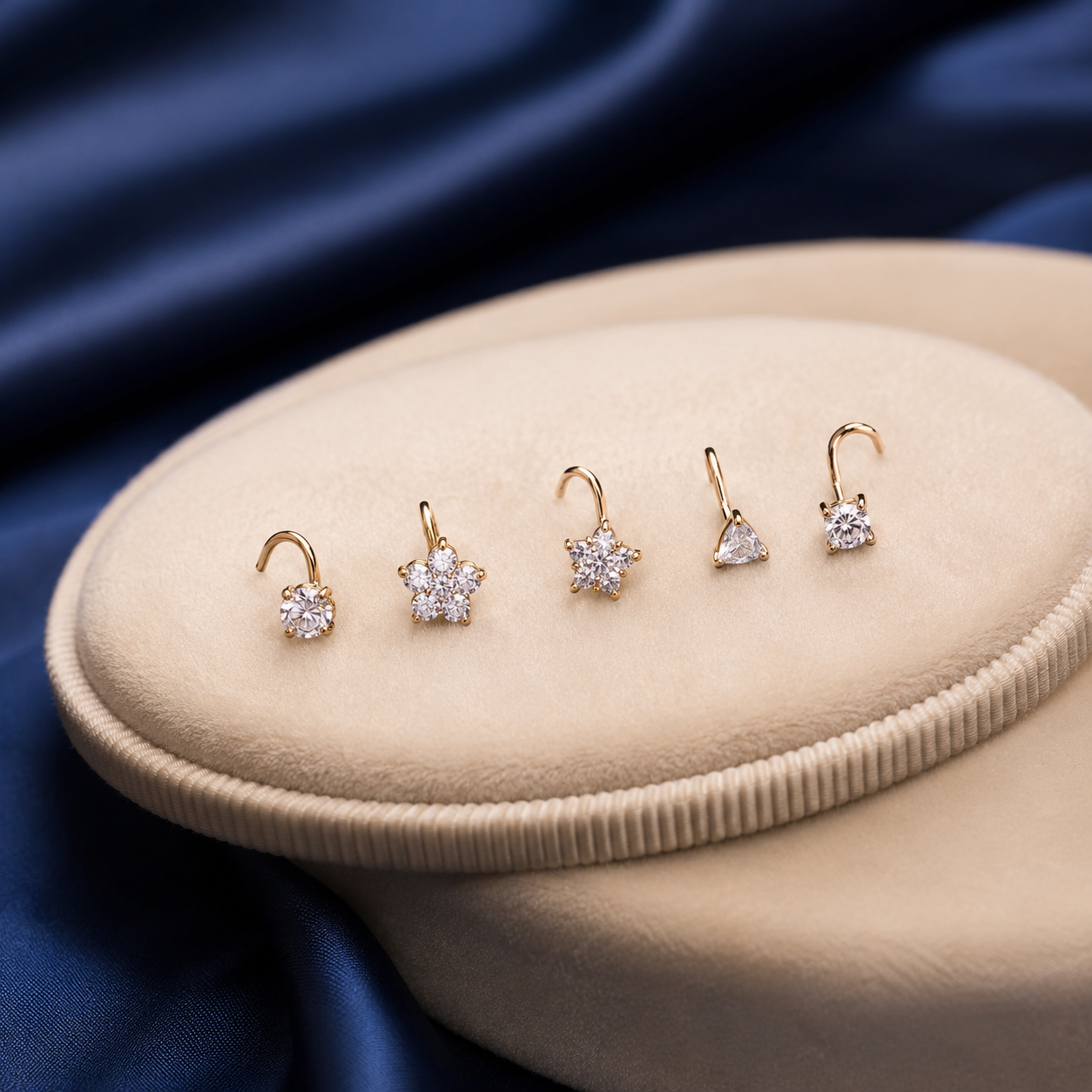 Lab grown diamond nose pin collection on luxury blue and cream background