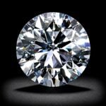 Sparkling round cut loose diamond with brilliant facets and exceptional fire on white background
