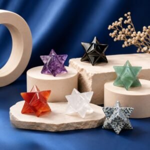 Natural Merkaba crystals on luxury blue and cream background