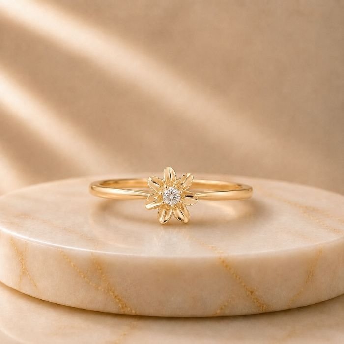 Golden Daisy Lab Grown Diamond Ring Golden Daisy Lab Grown Diamond Ring featuring a daisy-inspired floral design with a brilliant lab grown diamond displayed from front view, side view, top view, and angled perspective.