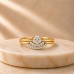 Starlit Curve Lab Grown Diamond Ring featuring a graceful curved design with a brilliant lab grown diamond displayed from front view, side view, top view, and angled perspective.