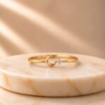 Luna Wave Lab Grown Diamond Ring featuring an elegant wave-inspired design with a brilliant lab grown diamond displayed from front view, side view, top view, and angled perspective.