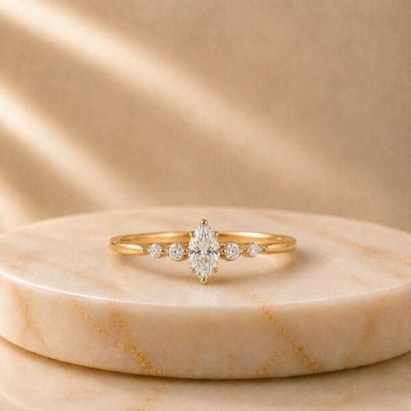 Seraphina Marquise Lab Grown Diamond Ring showing front view, side view, top view and angled perspective with brilliant marquise cut diamond.