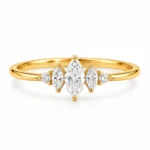 Marquise Lab Grown Diamond Ring with sparkling round diamond accents in an elegant, sophisticated design.