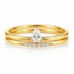 Pear Lab Grown Diamond Pavé Ring featuring an elegant pear-shaped diamond and sparkling pavé accents.