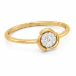 Aurelia Patel Floral Halo CVD Diamond Ring in polished yellow gold with round CVD diamond halo, angled front view on white background.