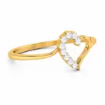 Gold heart-shaped diamond ring with sparkling round-cut diamonds on a polished yellow gold band