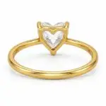 Back view of heart shaped solitaire diamond ring in polished yellow gold