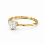 Heart shaped diamond solitaire ring with yellow gold band opposite side view