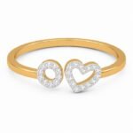 Adjustable gold ring with heart and circle design, featuring sparkling stones