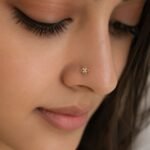Floral lab grown diamond nose pin for women in yellow gold worn on model