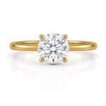Round solitaire diamond ring with polished yellow gold band front view