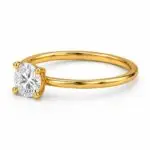 Round solitaire diamond ring in yellow gold shown from opposite side view