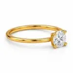 Round solitaire yellow gold diamond ring side view with polished gold band