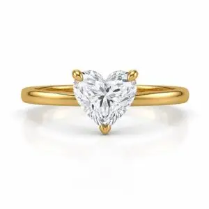 Heart Shaped Solitaire Gold Ring with Brilliant Cut Diamond on White Background