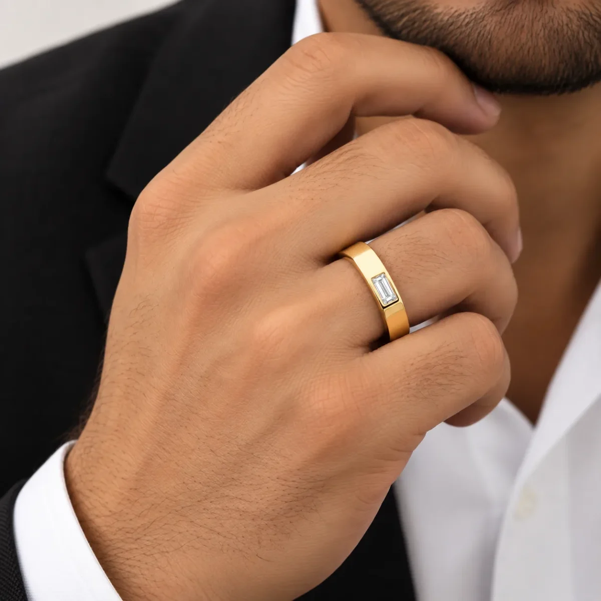 Baguette Lab Grown Diamond Men’s Ring in yellow gold worn on male model hand