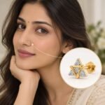 Trinity Spark Lab Grown Diamond Nose Pin worn on a model, featuring four round diamonds in an interlocking triangular gold design.