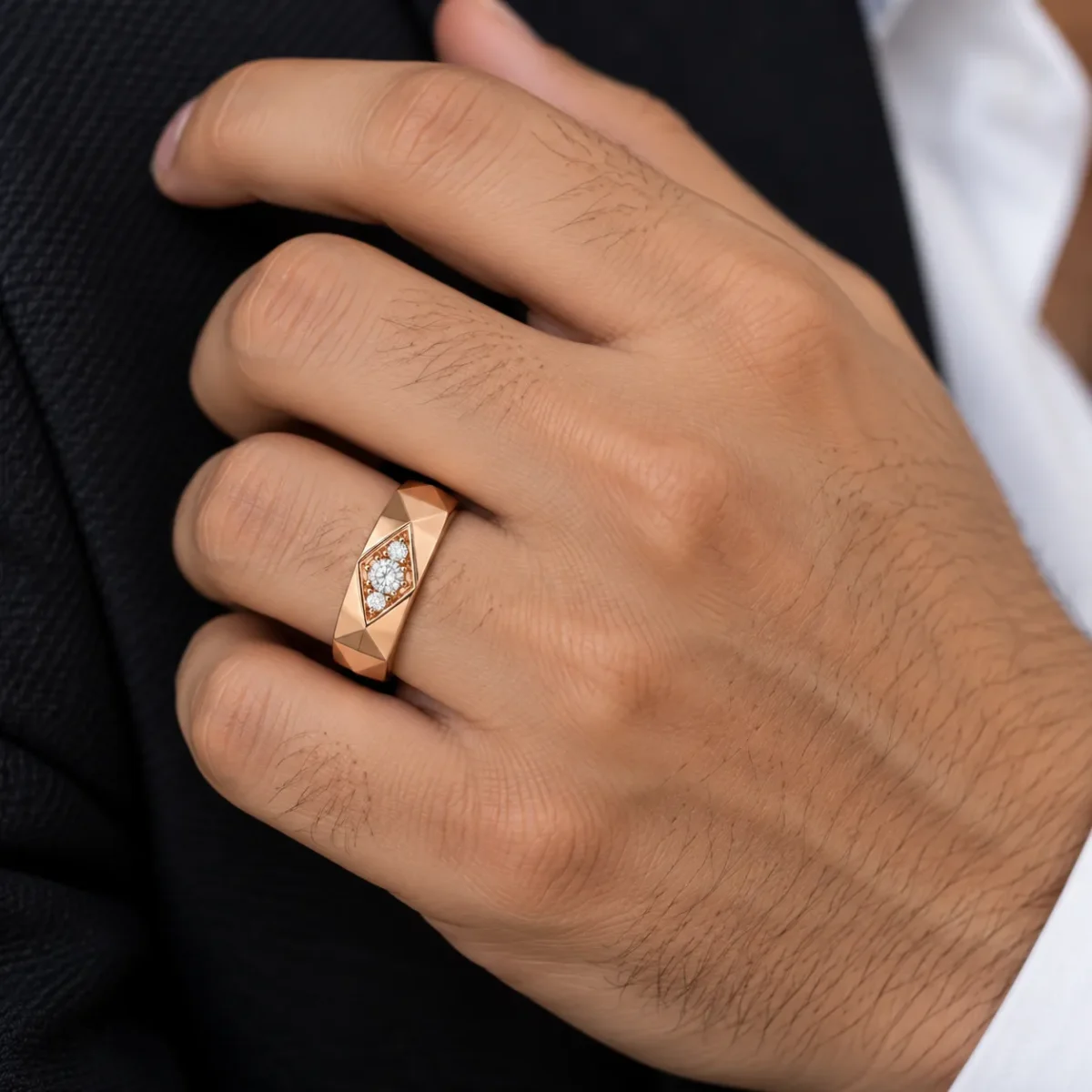 Prism Eye Lab Grown Diamond Ring in rose gold worn on a male model hand