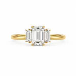 Emerald Cut Lab Grown Diamond Trilogy Ring featuring three stunning emerald-cut diamonds symbolizing the past, present, and future in an elegant luxury setting.
