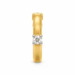 Lumi Solitaire Lab Grown Diamond Nose Ring in yellow gold, angled view showing round diamond and hoop design.