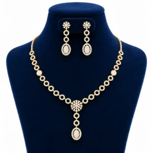 18K Gold Floral Oval Lab Grown Diamond Necklace Set with Matching Earrings featuring circular diamond motifs, floral centre pendant and elegant oval drop design displayed on a navy blue jewellery stand.