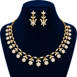 18K gold floral vine lab grown diamond necklace set with marquise diamond leaves, dangling flower clusters and matching earrings on navy blue jewellery bust
