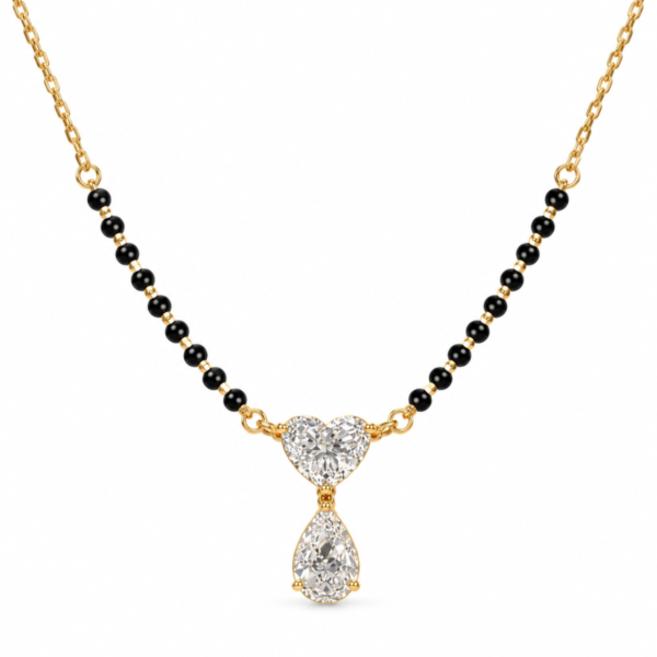 18K Gold Heart & Pear Cut Lab Grown Diamond Mangalsutra for Women featuring a 1 carat heart-shaped diamond, a 1 carat pear-shaped diamond and traditional black mangalsutra beads.