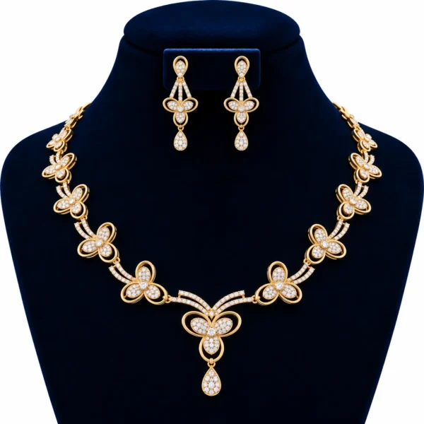 18K gold lab grown diamond floral necklace set with three-petal diamond flowers, central teardrop pendant and matching drop earrings on navy blue jewellery bust