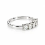 Five Wishes Moissanite Diamond Ring left side view featuring five brilliant round Moissanite stones and a smooth polished silver-tone band.