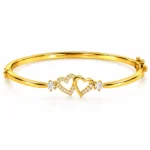 Interlocking Heart Lab Grown Diamond Bracelet for Women in Yellow Gold